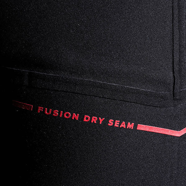 Black neoprene fabric with red 'Fusion Dry Seam' text on a close-up of clothing.