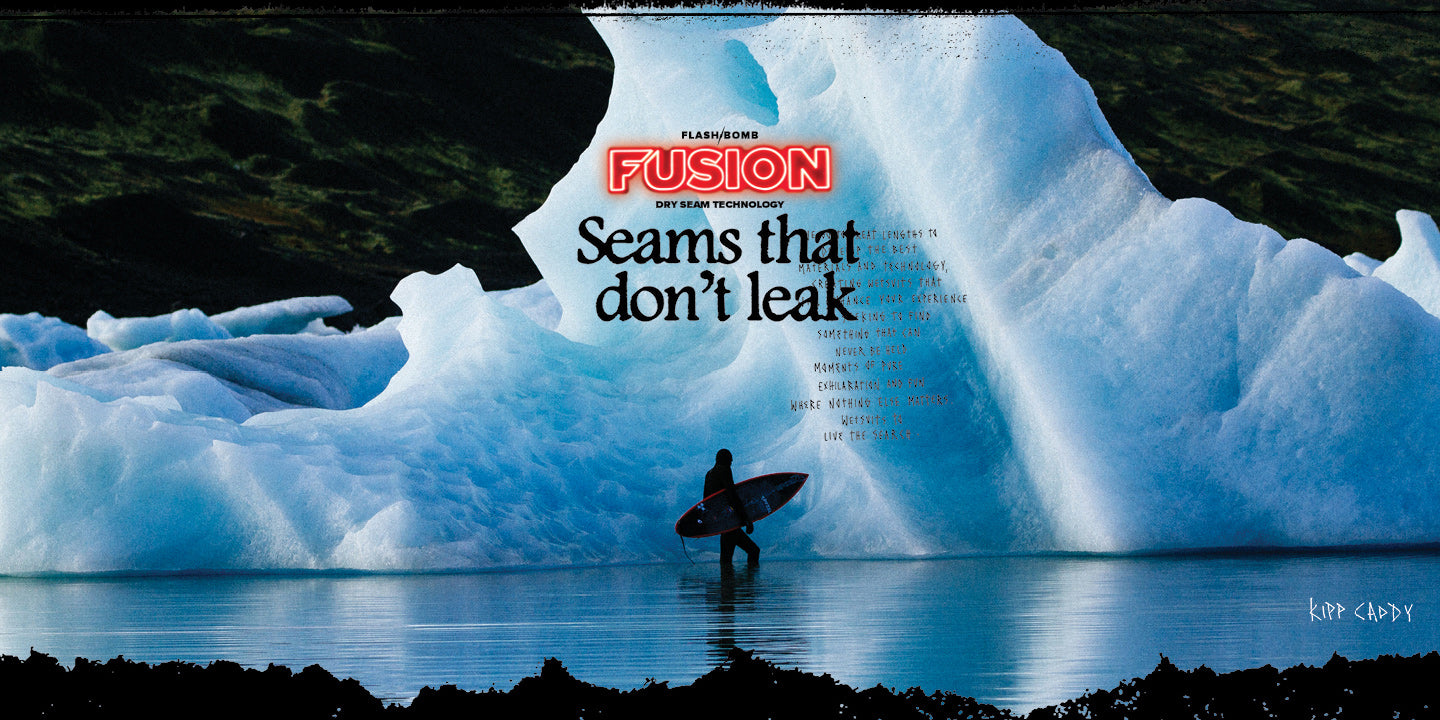 Person with a surfboard standing in front of an iceberg with 'Fusion' branding.