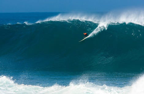 Surfer on a big wave in Hawaii